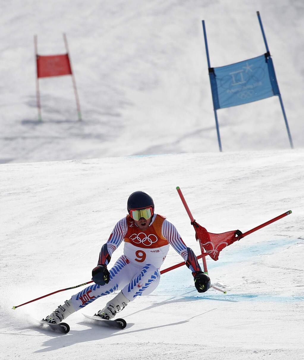 The United States' Ted Ligety competes during the first run of the men's giant slalom at the 2018 Winter Olympics in Pyeongchang, South Korea, Sunday, Feb. 18, 2018. (AP Photo/Christophe Ena)
