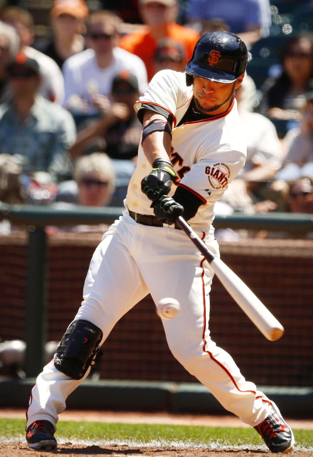 San Francisco Giants Gregor Blanco hits a single during his game against the Washington Nationals at AT&T Park on Thursday, June 12, 2014. (Conner Jay/The Press Democrat)