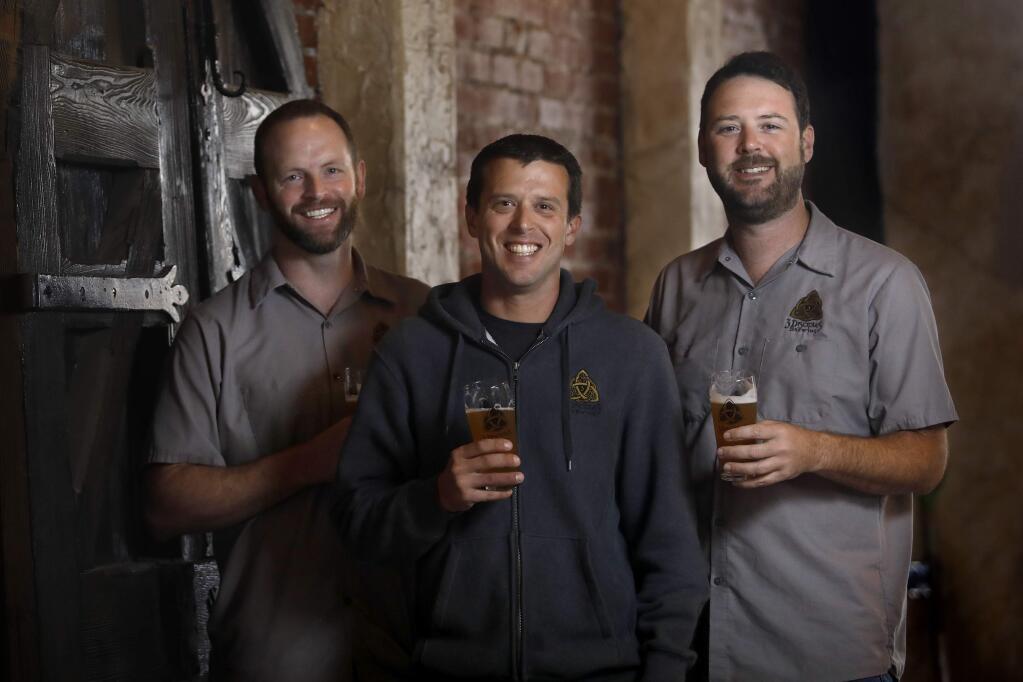 3 Disciples Brewing co-owners Matt Penpraze, left, Luke Melo, center, and James Claus at their new taproom due to open in the fall. Photo taken in Santa Rosa on Thursday, September 6, 2018. (Beth Schlanker/ The Press Democrat)