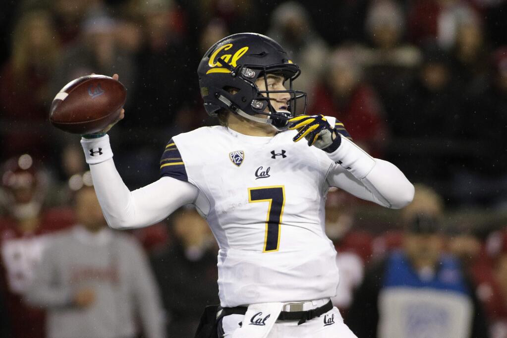 Cal quarterback Chase Garbers throws a pass during the first half against Washington State in Pullman, Wash., Saturday, Nov. 3, 2018. (AP Photo/Young Kwak)