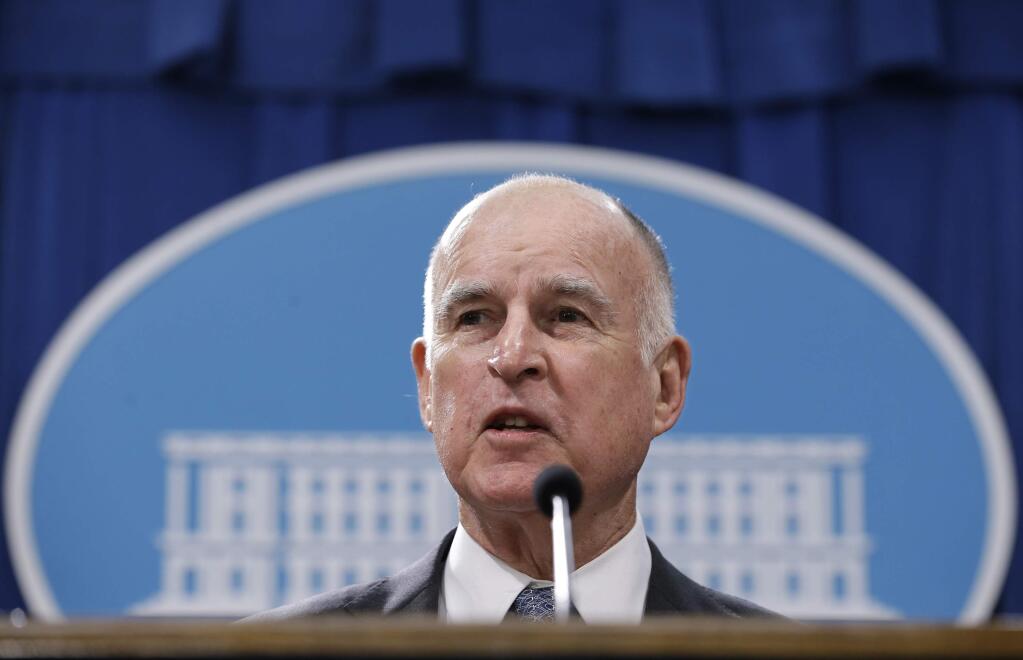 FILE - In this Jan. 10, 2017, file photo, California Gov. Jerry Brown discusses his 2017-2018 state budget plan he released at a news conference in Sacramento, Calif. (AP Photo/Rich Pedroncelli, File)