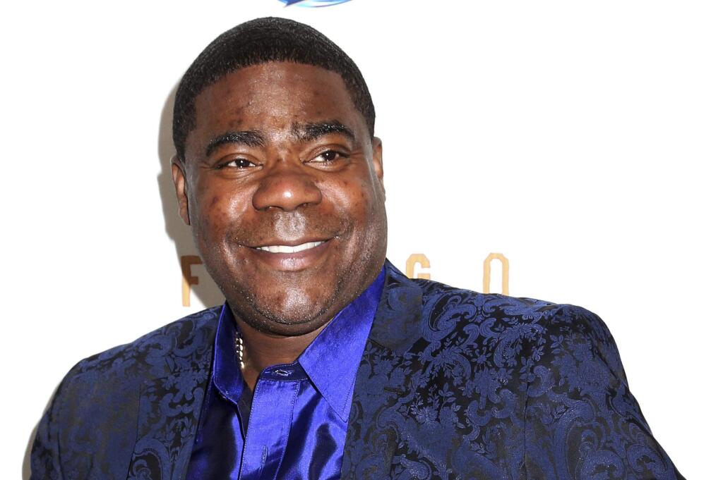 FILE - In this April 9, 2014 file photo, actor Tracy Morgan attends the FX Networks Upfront premiere screening of 'Fargo' at the SVA Theater in New York. Actor-comedian Morgan has settled his lawsuit against Wal-Mart over a New Jersey highway crash that killed one man and left Morgan and two friends seriously injured. A filing in federal court in Newark on Wednesday, May 27, 2015, refers to a confidential settlement reached by the two sides. (Photo by Greg Allen/Invision/AP, File)