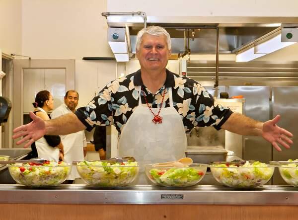 Chris Albertson a Rotary member and volunteer at the Petaluma Rotary Clubs crab feed February 20, 2015 at the Veterans Memorial Bldg. (JOHN O'HARA/FOR THE ARGUS-COURIER)