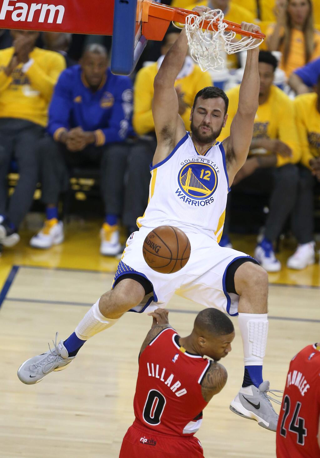 Golden State Warriors' Andrew Bogut dunks on Portland Trail Blazers' Damian Lillard, during their game in Oakland on Wednesday, May 11, 2016. (Christopher Chung/ The Press Democrat)