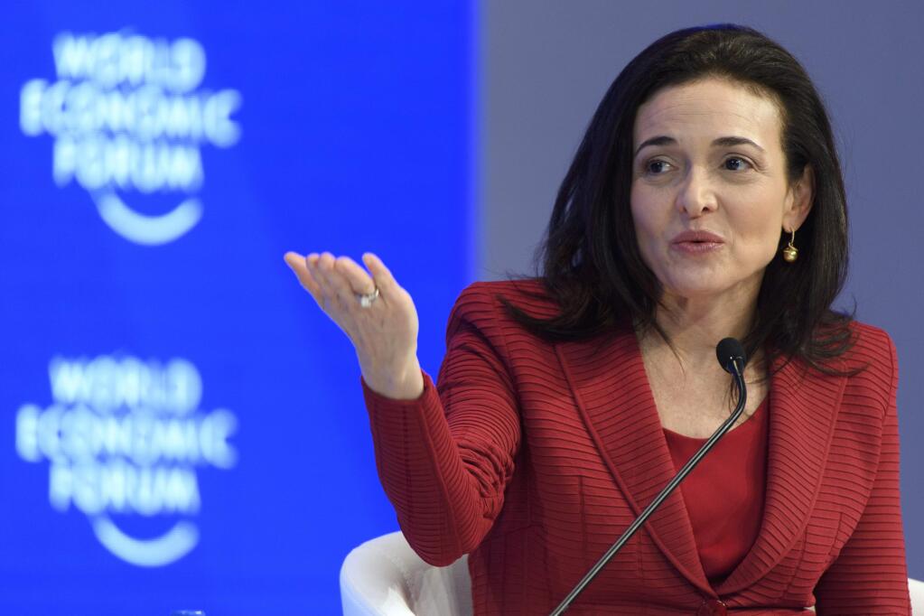 FILE - In this Wednesday, Jan. 18, 2017, file photo, Facebook Chief Operating Officer Sheryl Sandberg speaks during a plenary session during the annual meeting of the World Economic Forum in Davos, Switzerland. Sandberg says the ads linked to Russia trying to influence the U.S. presidential election should ‚Äúabsolutely‚Äù be released to the public. In an interview with Axios, Thursday, Oct. 12, 2017, Sandberg also said the company has the responsibility to prevent the kind of abuse that occurred on its platform during the election. (Laurent Gillieron/Keystone via AP, File)