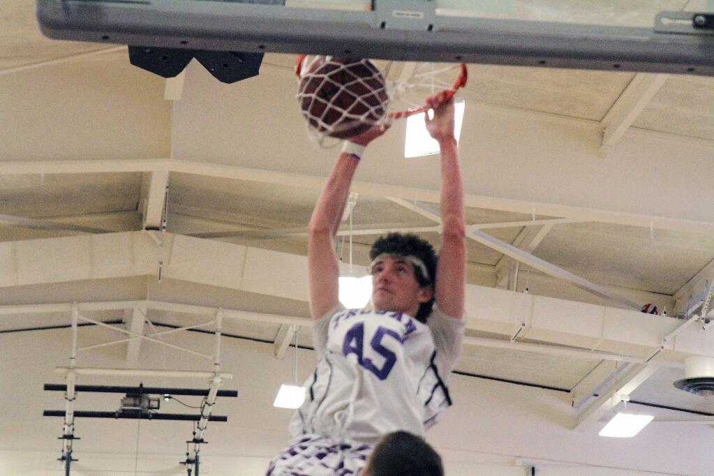 DWIGHT SUGIOKA/FOR THE ARGUS-COURIERPetaluma senior Joey Potts slams down two points in the Trojans' win over Rincon Valley Christian. Petaluma plays in the SCLtournament this week and then it is on to the NCS playoffs.