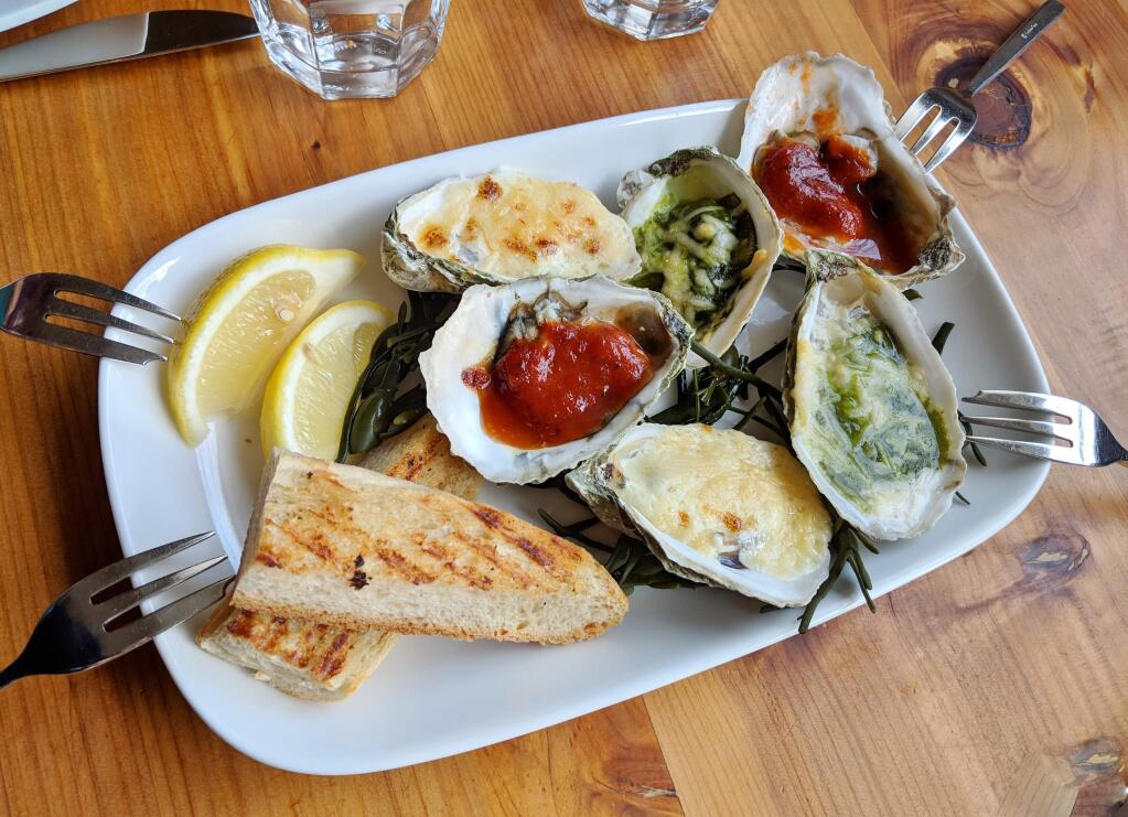 A collection of oysters, served baked, classic chipolte, Rockefeller and bingo, can be found on The Shuckery's lunch menu. (HOUSTON PORTER/FOR THE ARGUS-COURIER)