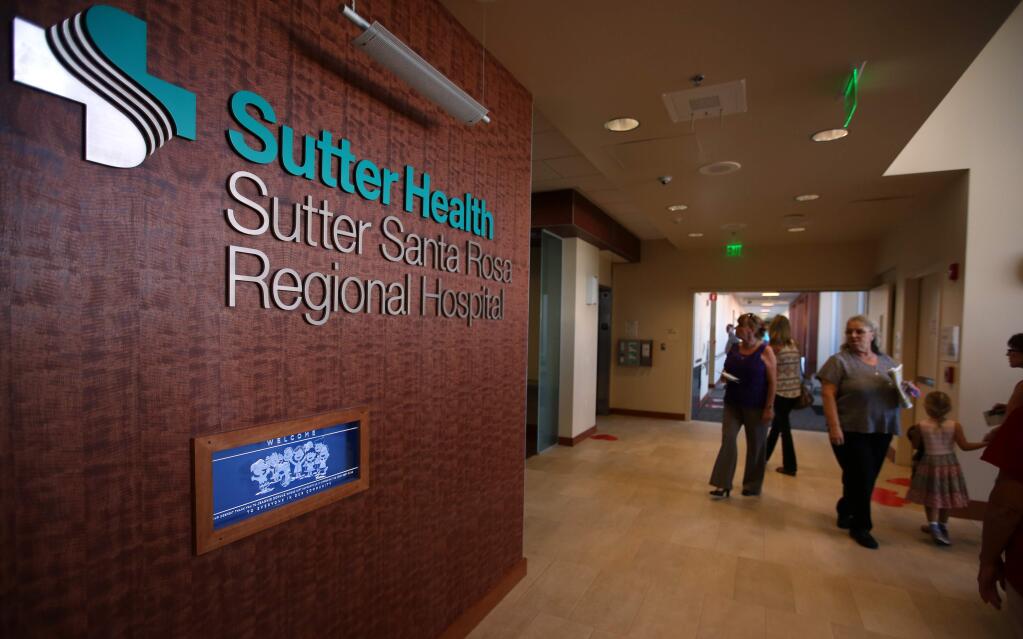People check out the new Sutter Santa Rosa Regional Hospital during a tour open to the public, Saturday, October 4, 2014. (Crista Jeremiason / The Press Democrat)
