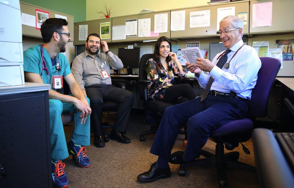 Dr. Gustavo Enrique Gonzalez-Mendez, right, meets with resident physicians Dr. Afsoon Foorohar, Dr. Guillermo Padilla and Dr. Brandon Cortez, as part of the Santa Rosa Family Medicine Residency Program, at the Vista Family Health Center, in Santa Rosa, on Wednesday, August 17, 2016. (Christopher Chung/ The Press Democrat)