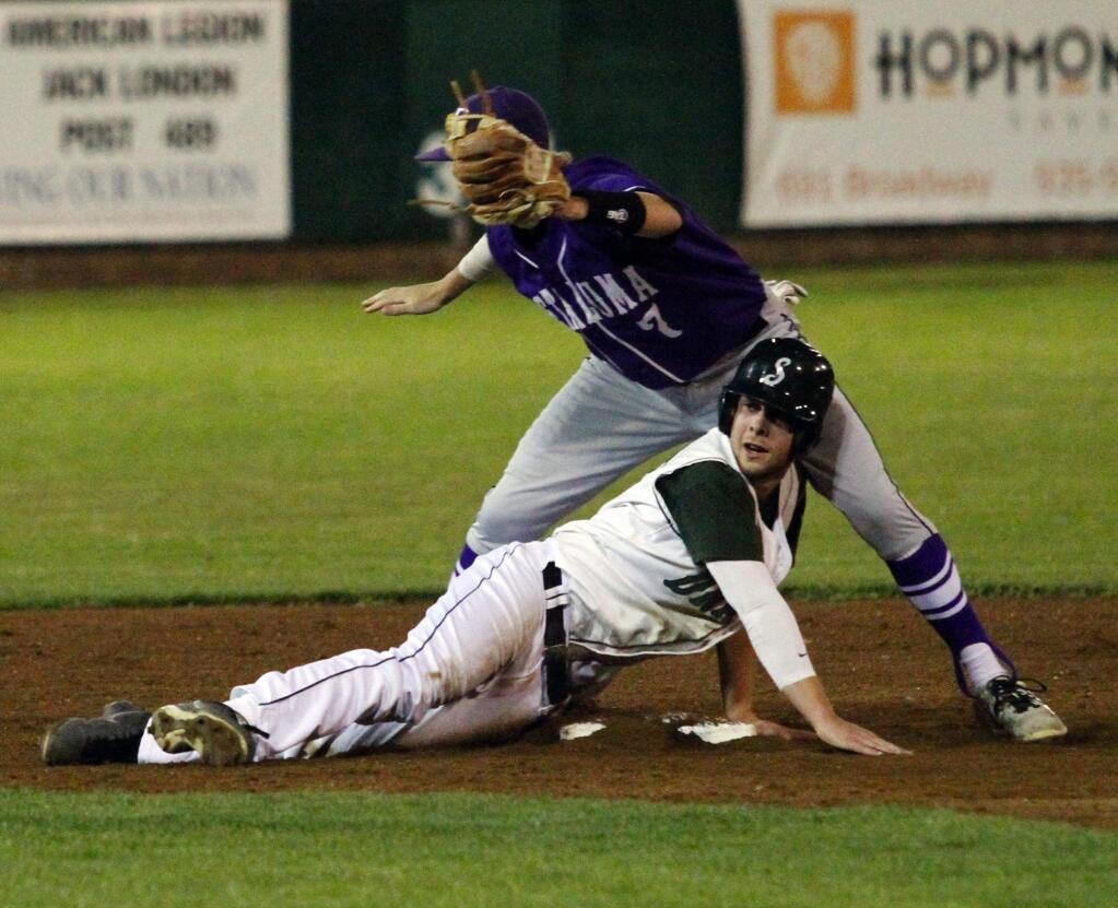 Bill Hoban/Index-TribuneSonoma's CJ Vitale looks for the safe call at second base during the Dragons' key SCL victory over longtime rival Petaluma Friday night at Arnold Field.