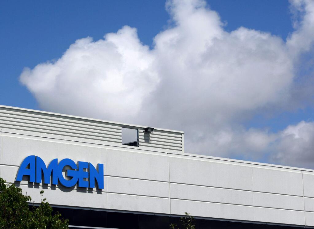 This April 20, 2010, file photo, shows an exterior view of Amgen offices in Fremont, Calif. Biotech drugmaker Amgen Inc. reports quarterly earnings on Tuesday, July 29, 2014. (AP Photo/Paul Sakuma, file)