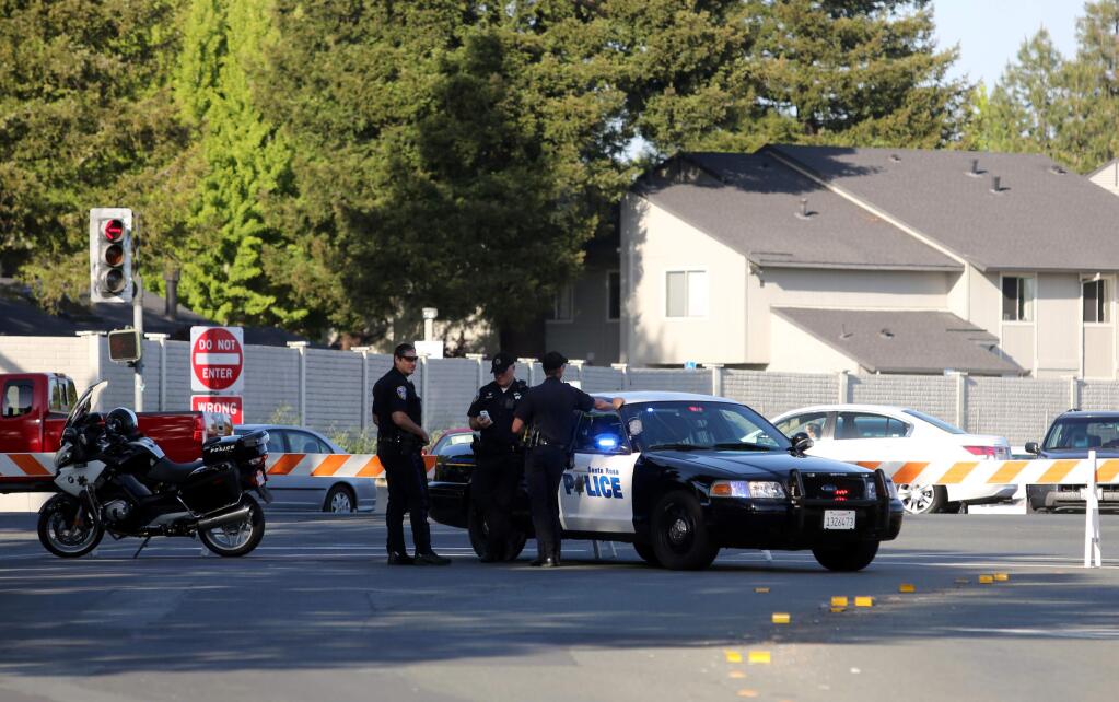 Police block off the westbound direction on Occidental Road at Stony Point as officers investigate the crash that killed Earnest Slone in May. (CRISTA JEREMIASON/ PD FILE, 2014)
