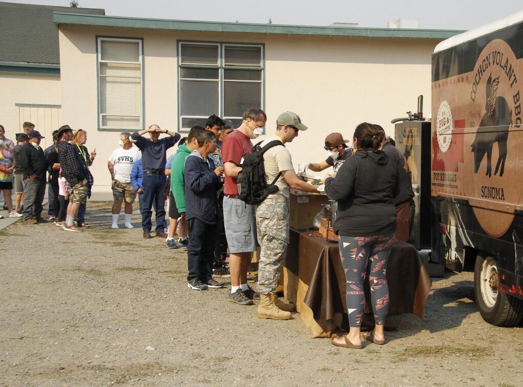 The scene at Sonoma Valley High School earlier in the week when Cochan Volant showed up to feed the evacuees.