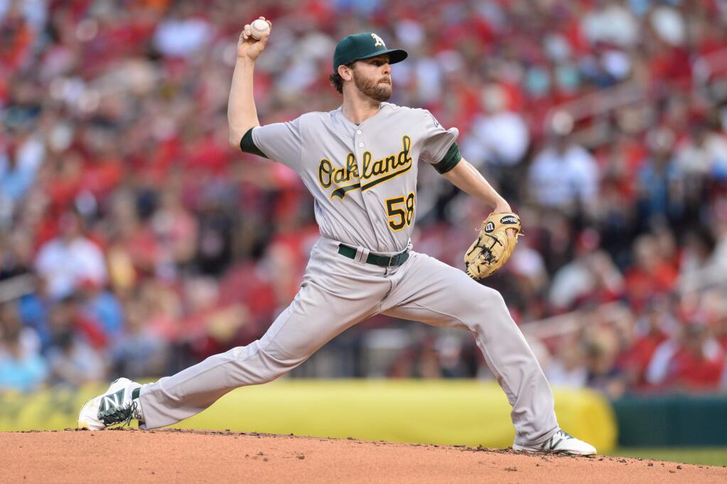 Oakland Athletics starting pitcher Zach Neal (58) pitches against the St. Louis Cardinals during the first inning of a baseball game Saturday, Aug. 27, 2016, in St. Louis. (AP Photo/Michael Thomas)