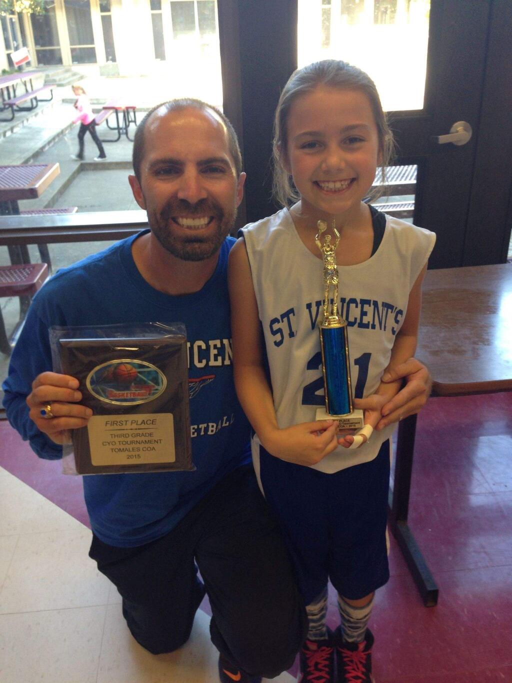 SUBMITTED PHOTONew St. Vincent High school basketball coach Scott Himes shares a proud moment with daughter Makayla.
