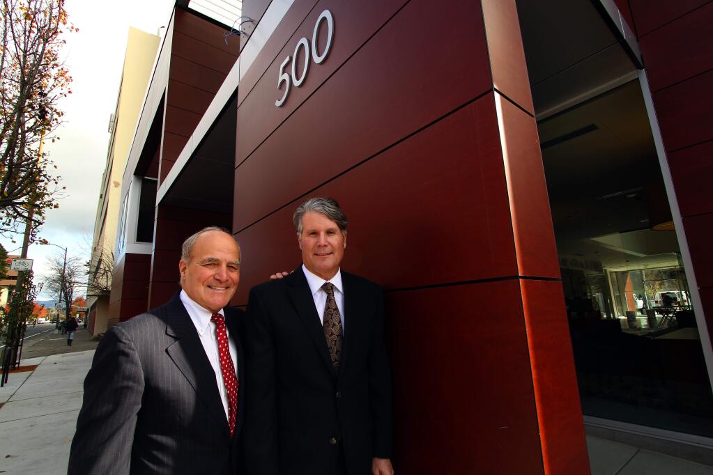 Vic Trione and John Biggs at the Luther Burbank Savings at B and Third streets in Santa Rosa in 2012. (PD FILE)