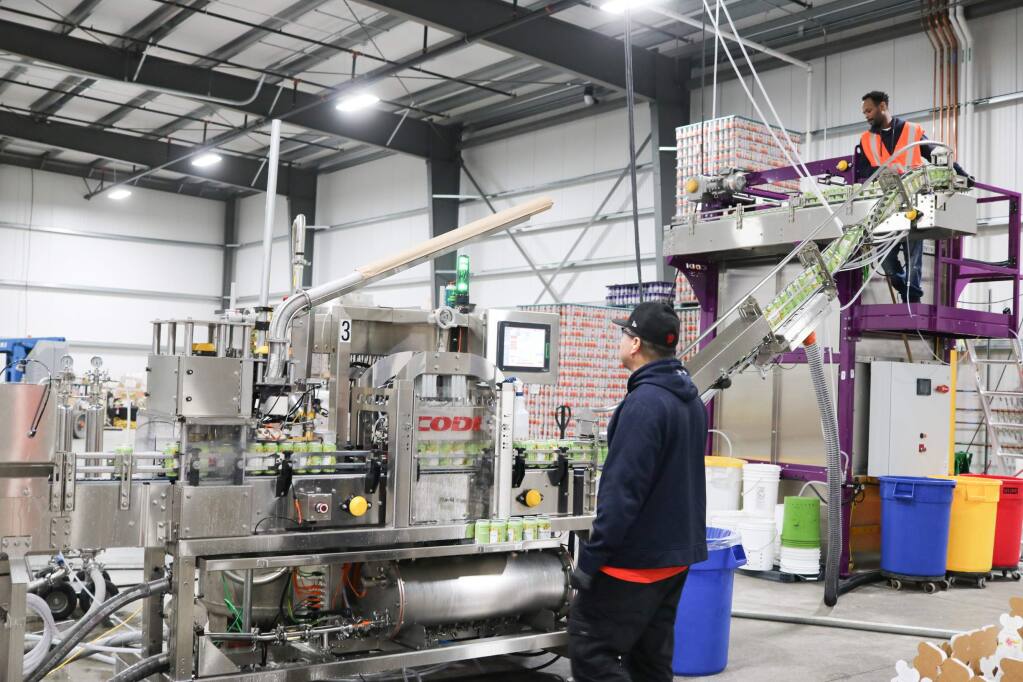 Free Flow Wines's Sonoma facility, opened in February 2019, has lines like this one that can fill up to 5 million cases of canned wine and other adult beverages annually. (COURTESY OF FREE FLOW WINES)
