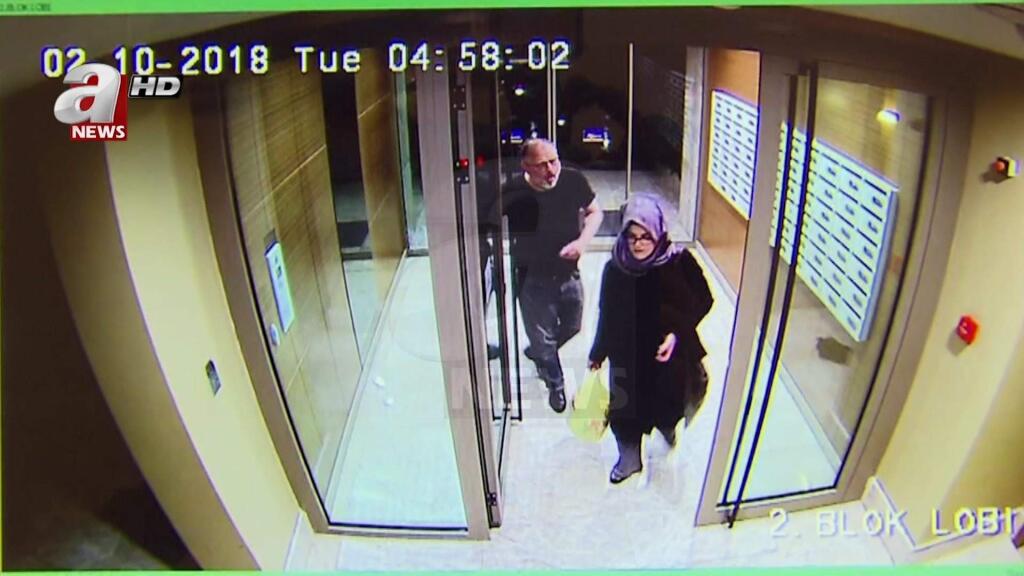 In this image taken from CCTV video that emerged Monday Oct. 22, 2018, purportedly showing Saudi writer Jamal Khashoggi and his fiancee, Hatice Cengiz, at an apartment building in Istanbul, Turkey, just hours before his death in the Saudi Arabian Consulate. The video was broadcast by the pro-Turkish government Turkish television channel A News, and was said to be obtained via Turkey's security sources. (A News via AP) MANDATORY CREDIT - DO NOT OBSCURE LOGO