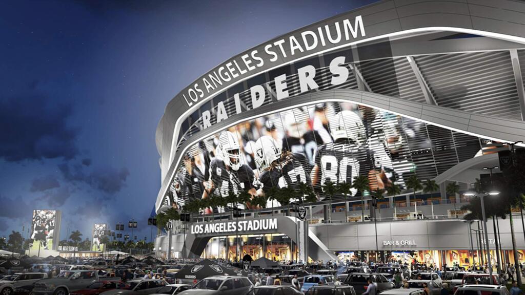 This artists's rending provided by Carson2gether shows the exterior of revised plans for a proposed stadium that would house both the Chargers and the Raiders NFL football teams, shown here in Raiders home game configuration, in Carson, Calif. New designs for the proposed NFL stadium in the Los Angeles area include simulated lightning bolts for the San Diego Chargers and an eternal flame honoring late Oakland Raiders owner Al Davis. The thoroughly revamped stadium renderings for the $1.7 billion joint stadium planned by the two teams were released on Thursday, April 23, 2015. (Manica Architecture/Carson2gether via AP)