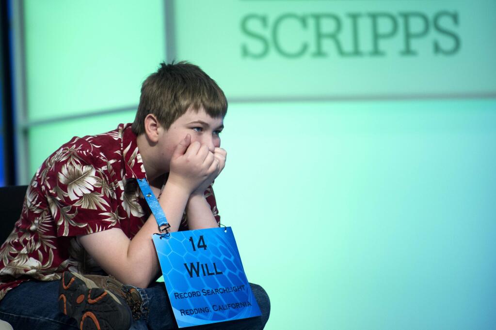 William Cooper, 13, of Redding, Calif. waits to spell during the preliminary round two of the Scripps National Spelling Bee in National Harbor, Md., Wednesday, May 25, 2016. (AP Photo/Cliff Owen)