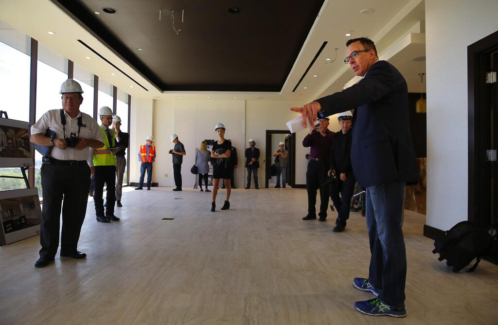 Federated Indians of Graton Rancheria tribal chairman Greg Sarris shows an unfinished 2,600 square-foot luxury suite during a media tour of the Graton Resort & Casino's new hotel, in Rohnert Park, on Wednesday, September 28, 2016. (Christopher Chung/ The Press Democrat)