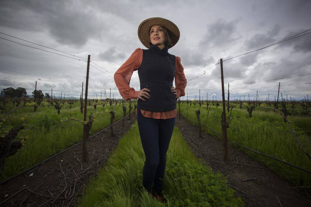 Vanessa Robledo in her vineyard off of Ramal Road in the Carneros region. (Photo by Robbi Pengelly/Index-Tribune)