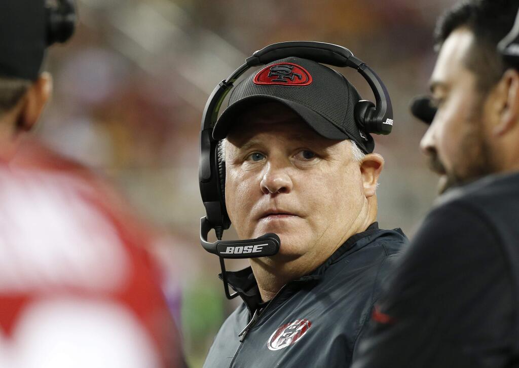 San Francisco 49ers coach Chip Kelly stands on the sideline during the first half of an game against the Green Bay Packers on Friday, Aug. 26, 2016, in Santa Clara. (AP Photo/Tony Avelar)