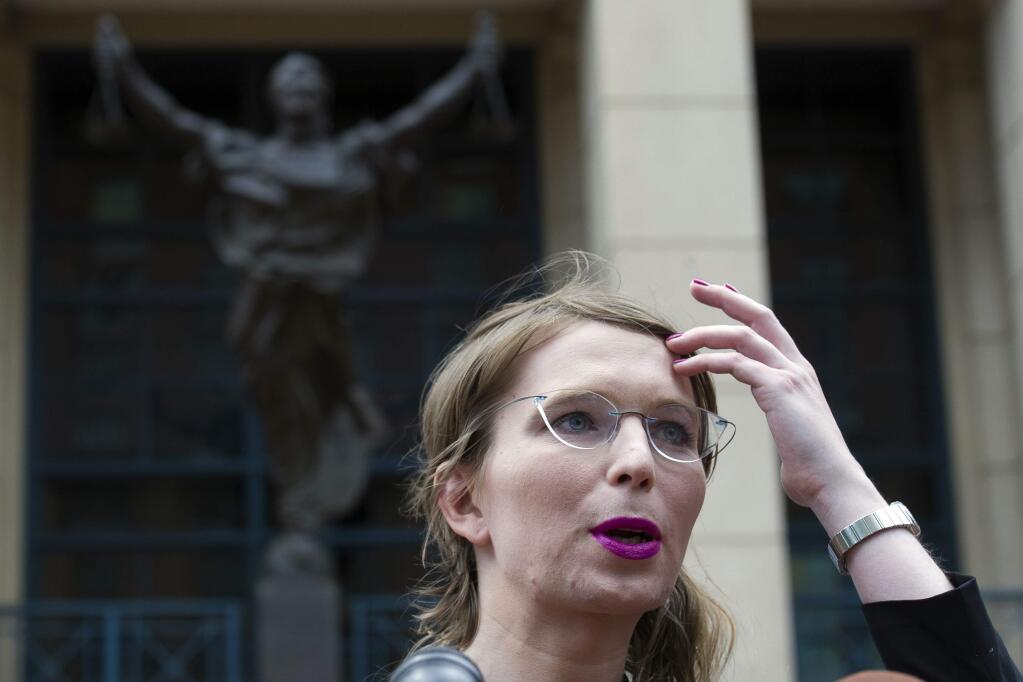Former Army intelligence analyst Chelsea Manning speaks with reporters, after arriving at the federal courthouse in Alexandria, Va., Thursday, May 16, 2019. Manning spoke about the federal court's continued attempts to compel her to testify in front of a grand jury. (AP Photo/Cliff Owen)