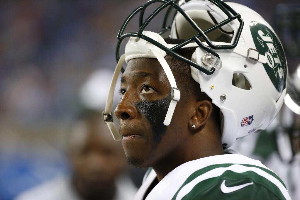 New York Jets wide receiver Walt Powell looks towards the scoreboard during the second half of an NFL preseason football game against the Detroit Lions, Thursday, Aug. 13, 2015, in Detroit. (AP Photo/Paul Sancya)