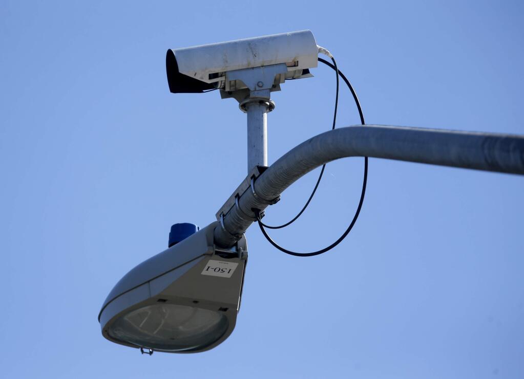 A camera mounted at the corner of College Avenue and Mendocino Avenue in Santa Rosa, on Tuesday, Oct. 18, 2016. (BETH SCHLANKER/ The Press Democrat)
