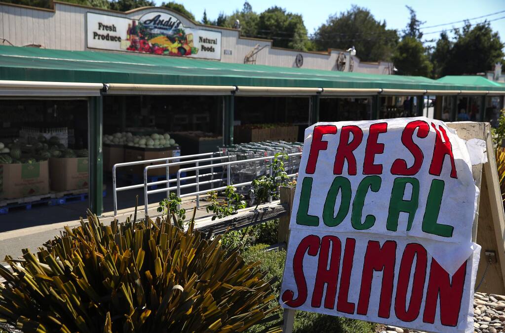 A sign at Andy's Produce Market advertizes fresh local salmon, in Sebastopol, on Monday, September 21, 2015. (Christopher Chung/ The Press Democrat)