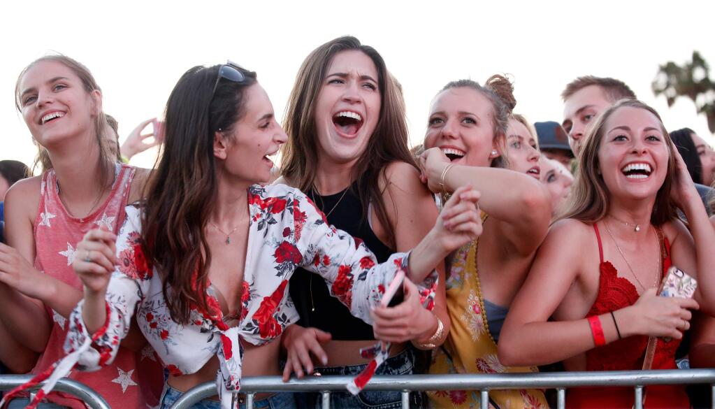 Concertgoers sing and dance as Thomas Rhett performs live on stage during Country Summer at the Sonoma County Fairgrounds in Santa Rosa, California on Friday, June 16, 2017. (Alvin Jornada / The Press Democrat)