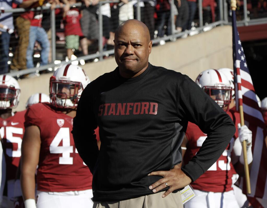 In this Sept. 17, 2016, file photo, Stanford head coach David Shaw prepares to enter the field with his team before a game against USC in Stanford. Stanford vs. Notre Dame looked like a big game before the season. It's not drawing much interest at midseason. (AP Photo/Marcio Jose Sanchez, File)