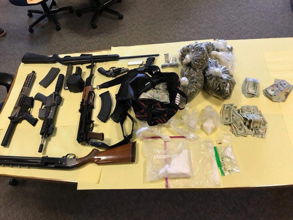 Guns and drugs seized from a home on Olive Street in Santa Rosa on Thursday, April 27, 2017. (SANTA ROSA POLICE DEPARTMENT/ FACEBOOK)
