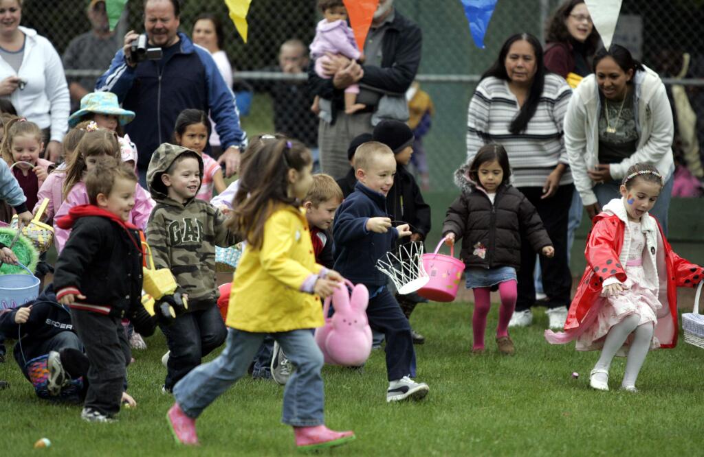 KIds aged 4 and 5 ran scrambling for plastic easter eggs and candy as their parents watched during the Easter egg hunt at Howarth Park in Santa Rosa, Saturday April 7, 2007 (Crista Jeremiason / The Press Democrat) 4/7/07