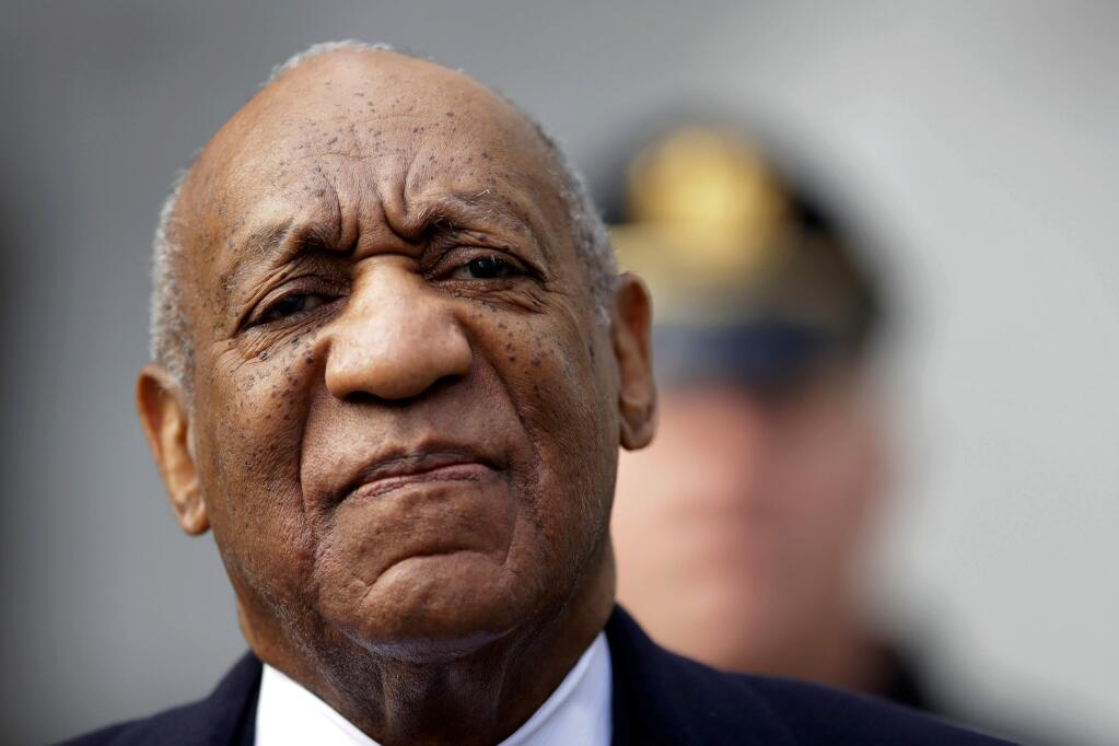 FILE - In this April 18, 2018 file photo, Bill Cosby arrives for his sexual assault trial at the Montgomery County Courthouse in Norristown, Pa. The prosecutors who put Cosby away said Sunday, April 29, 2018, they're confident the conviction at his suburban Philadelphia sexual-assault retrial will stand. (AP Photo/Matt Slocum, File)