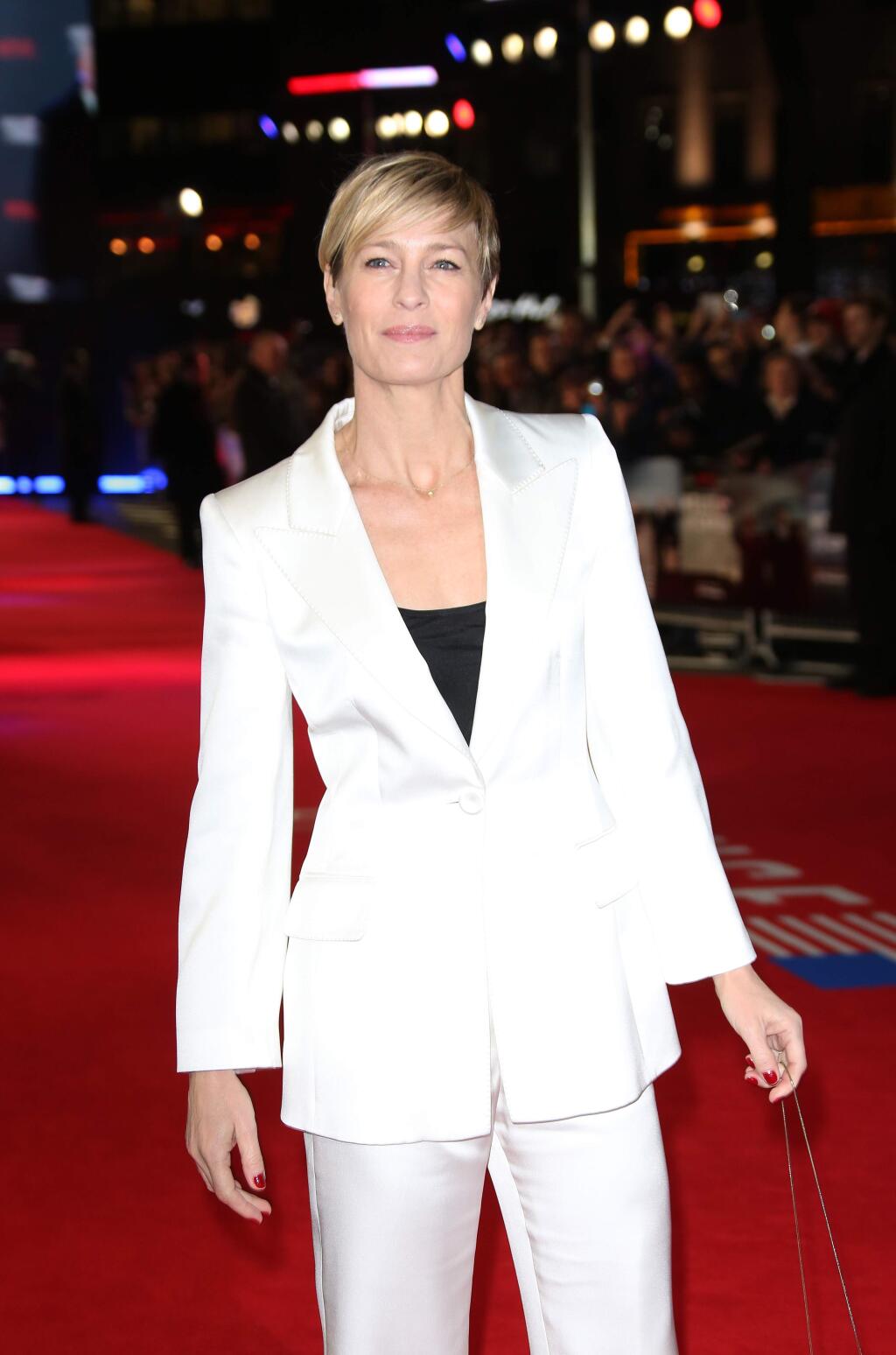 Actress Robin Wright poses for photographers upon arrival at the House Of Cards season 3 World Premiere at the Empire Cinema in central London, Thursday, Feb. 26, 2015. (Photo by Joel Ryan/Invision/AP)