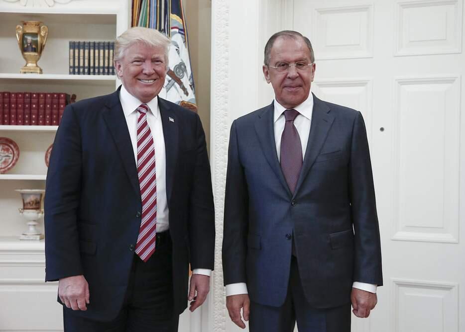 President Donald Trump meets with Russian Foreign Minister Sergey Lavrov, right, at the White House in Washington, Wednesday, May 10, 2017. President Donald Trump on Wednesday welcomed Vladimir Putin's top diplomat to the White House for Trump's highest level face-to-face contact with a Russian government official since he took office in January. (Russian Foreign Ministry Photo via AP)