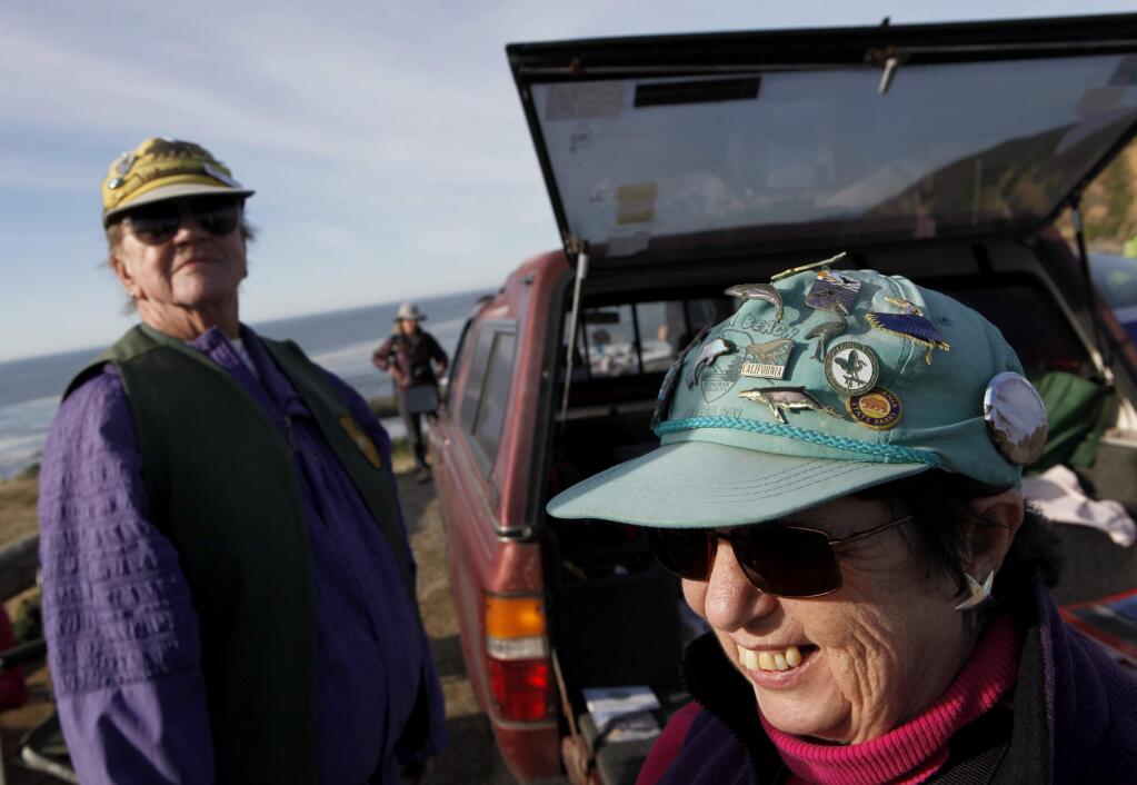 State Parks volunteer Norma Jellison, right, wears a hat covered in wildlife pins at Bodega Head near Bodega Bay on Sunday, Jan. 8, 2012. (BETH SCHLANKER/ PD FILE)