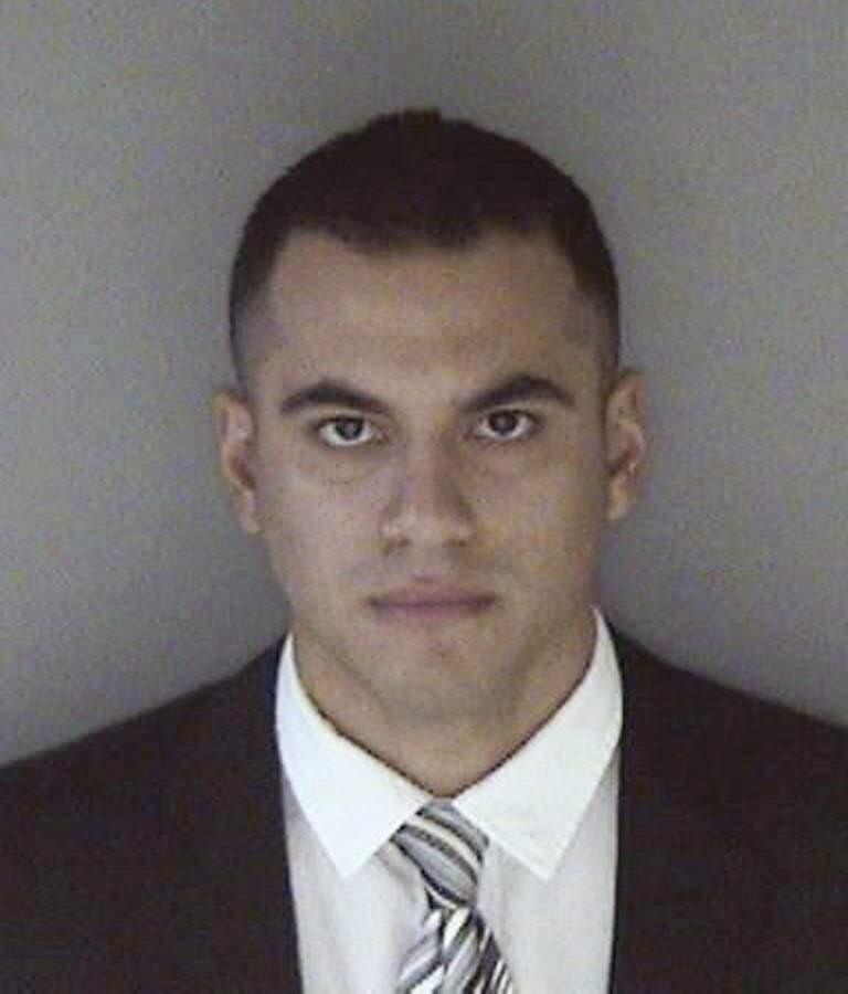 This undated photo provided by the Alameda County Sheriff's Office shows Marco Becerra. Becerra, a former Northern California police officer, was charged with statutory rape after admitting he had sex with a 17-year-old girl he met at his police department. Becerra met the girl while working as an instructor at the department's Explorer program. The program is designed to give teenagers a head start in a law enforcement career through training and community work. (Alameda County Sheriff's Office via AP)