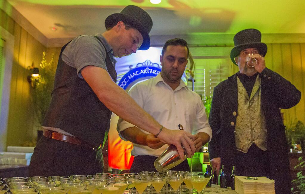 The Best Overall Martini prize went Saddles Steakhouse. (From left) Bryan Tatum, who invented the potion, Matthew Martinez and 'The Count', George Webber. Martini Madness took place again this year at MacArthur Place Inn and Spa on Friday, Jan 13. Bartenders from local Sonoma Valley restaurants presented their martini concoctions to a sold-out crowd. (Photo by Robbi Pengelly/Index-Tribune)