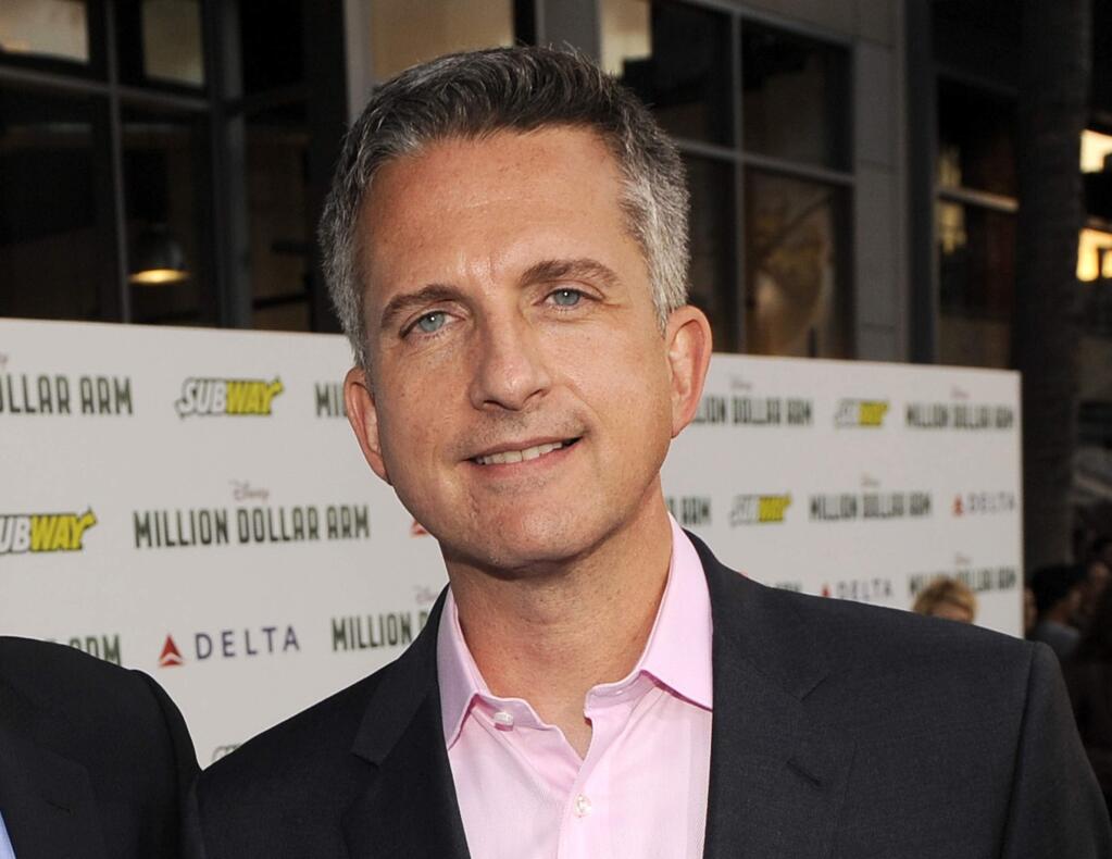 FILE - In this May 6, 2014 file photo, Bill Simmons arrives at the world premiere of 'Million Dollar Arm' at El Capitan Theatre in Los Angeles. HBO says it has struck a multi-year, multi-platform deal with the multi-faceted Bill Simmons. Under the deal, which begins in October, HBO will be Simmons exclusive television home, the network said Wednesday, July 22, 2015. (Photo by Chris Pizzello/Invision/AP, File)