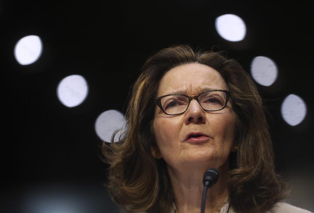 In this May 9, 2018 photo, CIA nominee Gina Haspel testifies during a confirmation hearing of the Senate Intelligence Committee, on Capitol Hill in Washington. In a letter Tuesday to the top Democrat on the Senate Intelligence Committee, Haspel says she would ‚Äúrefuse to undertake any proposed activity that is contrary to my moral and ethical values.‚Äù (AP Photo/Pablo Martinez Monsivais)