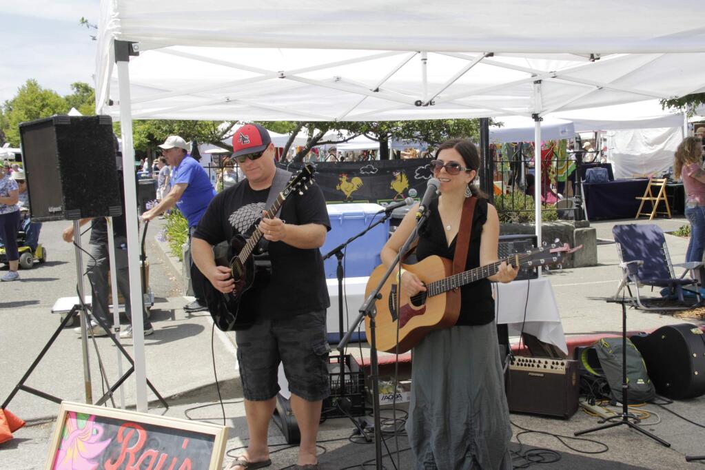 Todd Bugbee & Judy Jeanne entertaining the Festival on Ray's Deli & Tavern Acoustic Stage at Petaluma's 14th Annual Art & Garden Festival in downtown Petaluma on Sunday, July 12, 2015. (Jim Johnson/For the Argus-Courier)
