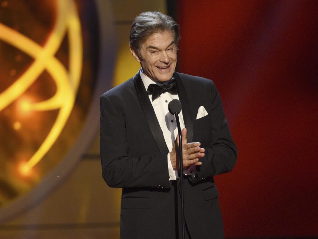 Dr. Oz presents the award for outstanding entertainment news program at the 46th annual Daytime Emmy Awards at the Pasadena Civic Center on Sunday, May 5, 2019, in Pasadena, Calif. (Photo by Chris Pizzello/Invision/AP)