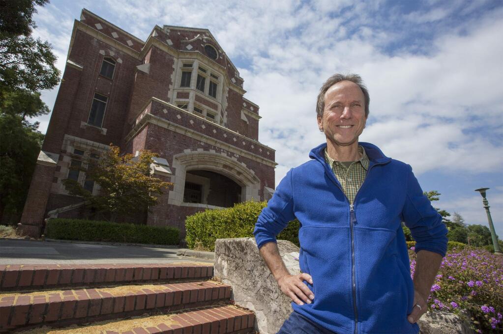 Richard Dale, executive director of The Ecology Center, at the most recognizable building on the Sonoma Developmental Center's campus. (Photo by Robbi Pengelly/Index-Tribune)