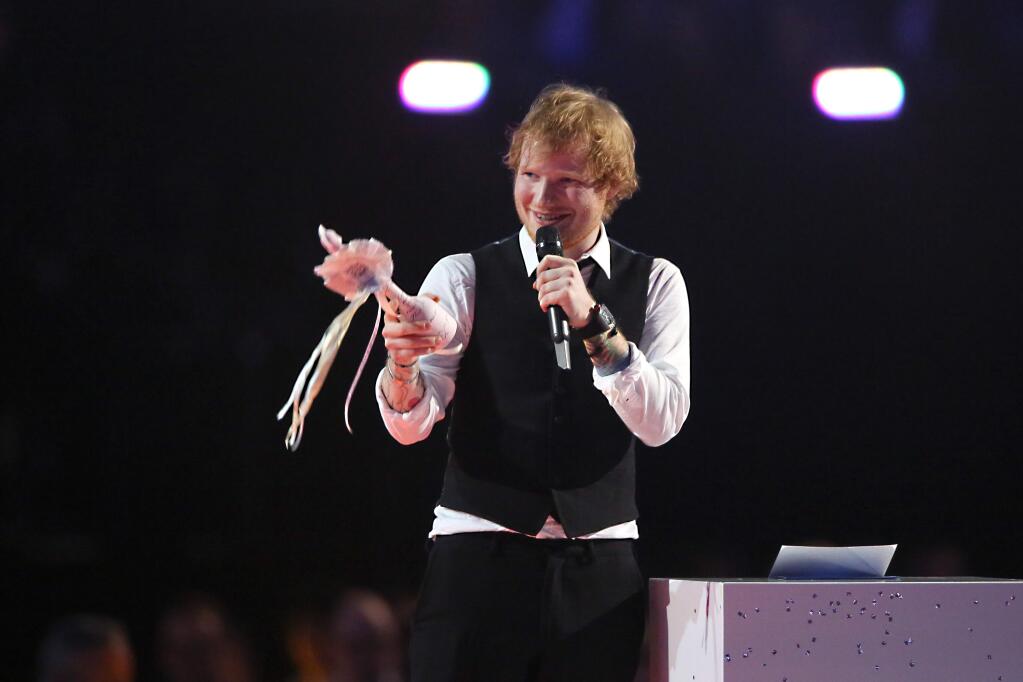 Ed Sheeran receives the award for best British Album onstage at the Brit Awards 2015 at the 02 Arena in London, Wednesday, Feb. 25, 2015. (Photo by Joel Ryan/Invision/AP)