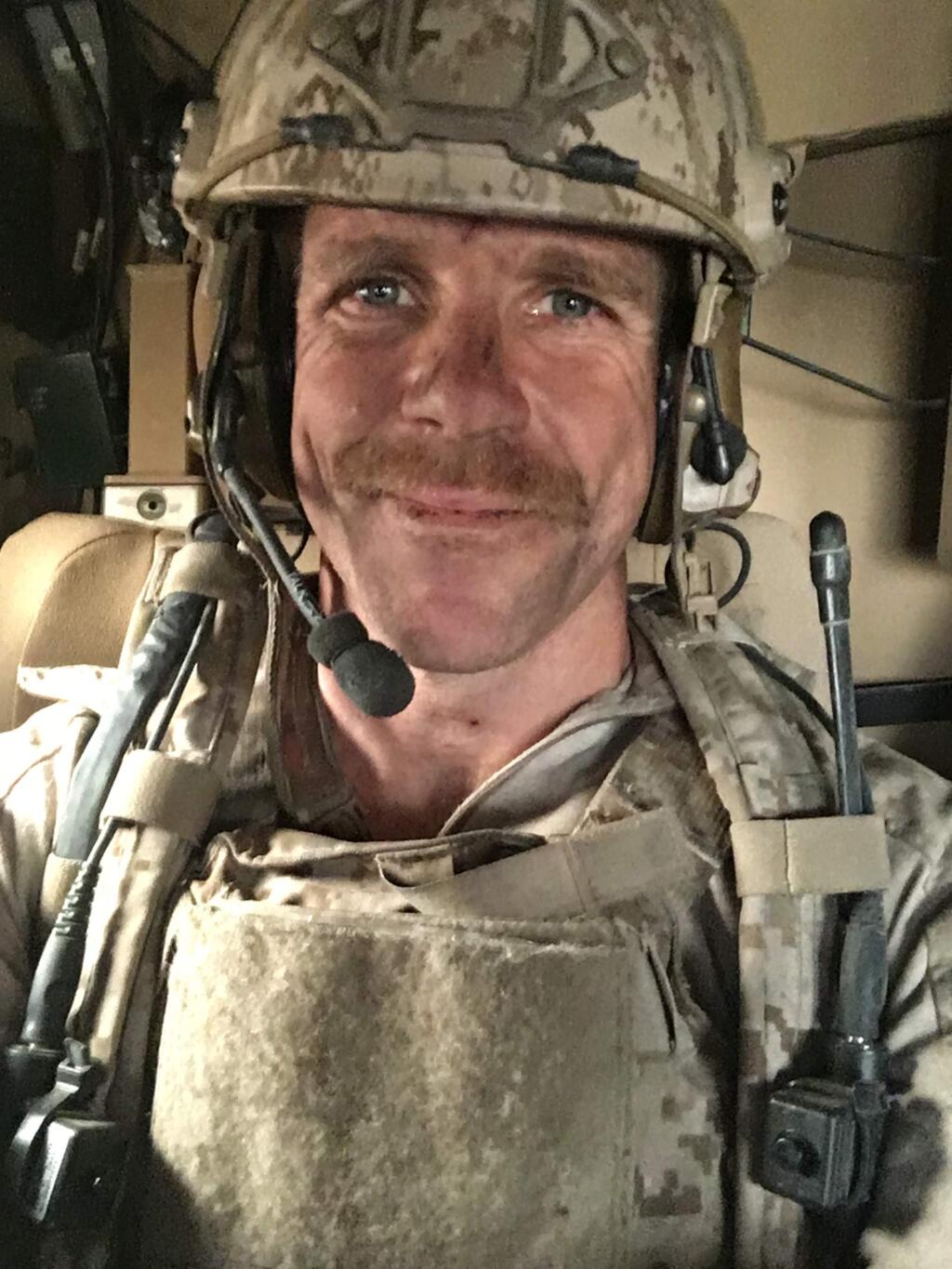 In an undated handout photo, Special Operations Chief Edward Gallagher, seen during his 2017 deployment, who may face a military trial on murder and other charges. Prosecutors say Gallagher turned bloodthirsty on his eighth deployment, shooting civilians and stabbing a captive. His lawyer called the charges baseless. (Handout via The New York Times) -- NO SALES; FOR EDITORIAL USE ONLY WITH NYT STORY NAVY SEAL CHARGES BY DAVE PHILIPPS FOR NOV. 16, 2018. ALL OTHER USE PROHIBITED. --