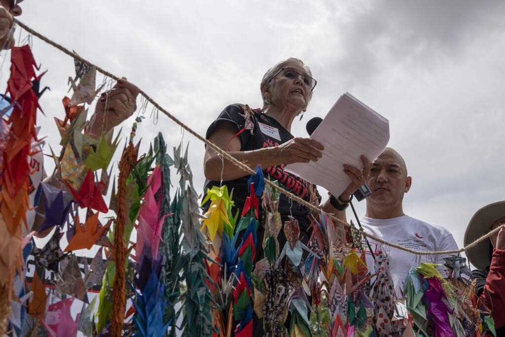 Satsuki Ina speaks at a protest against plans to house migrant children at Fort Sill, once the site of a Japanese internment camp, in Lawton, Okla., June 22, 2019. Protesters called the plan a return to one of the nation's great shames. “We are here to say, ‘Stop repeating history,' ” said Ina, who was born in a Japanese-American internment camp during World War II. (Nick Oxford/The New York Times)