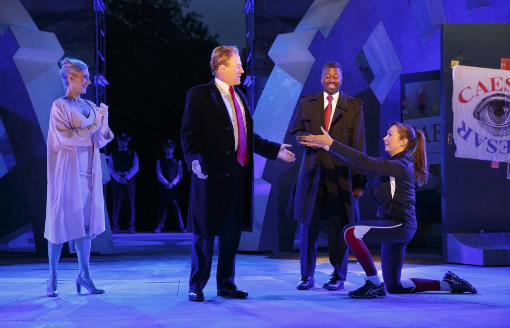 FILE - In this May 21, 2017, file photo provided by The Public Theater, Tina Benko, left, portrays Melania Trump in the role of Caesar's wife, Calpurnia, and Gregg Henry, center left, portrays President Donald Trump in the role of Julius Caesar during a dress rehearsal of The Public Theater's Free Shakespeare in the Park production of Julius Caesar in New York. Teagle F. Bougere, center right, plays as Casca, and Elizabeth Marvel, right, as Marc Anthony. Delta Air Lines is pulling its sponsorship of New York's Public Theater for portraying Julius Caesar as the Donald Trump look-alike in a business suit who gets knifed to death on stage, according to its statement Sunday, June 11, 2017. (Joan Marcus/The Public Theater via AP)